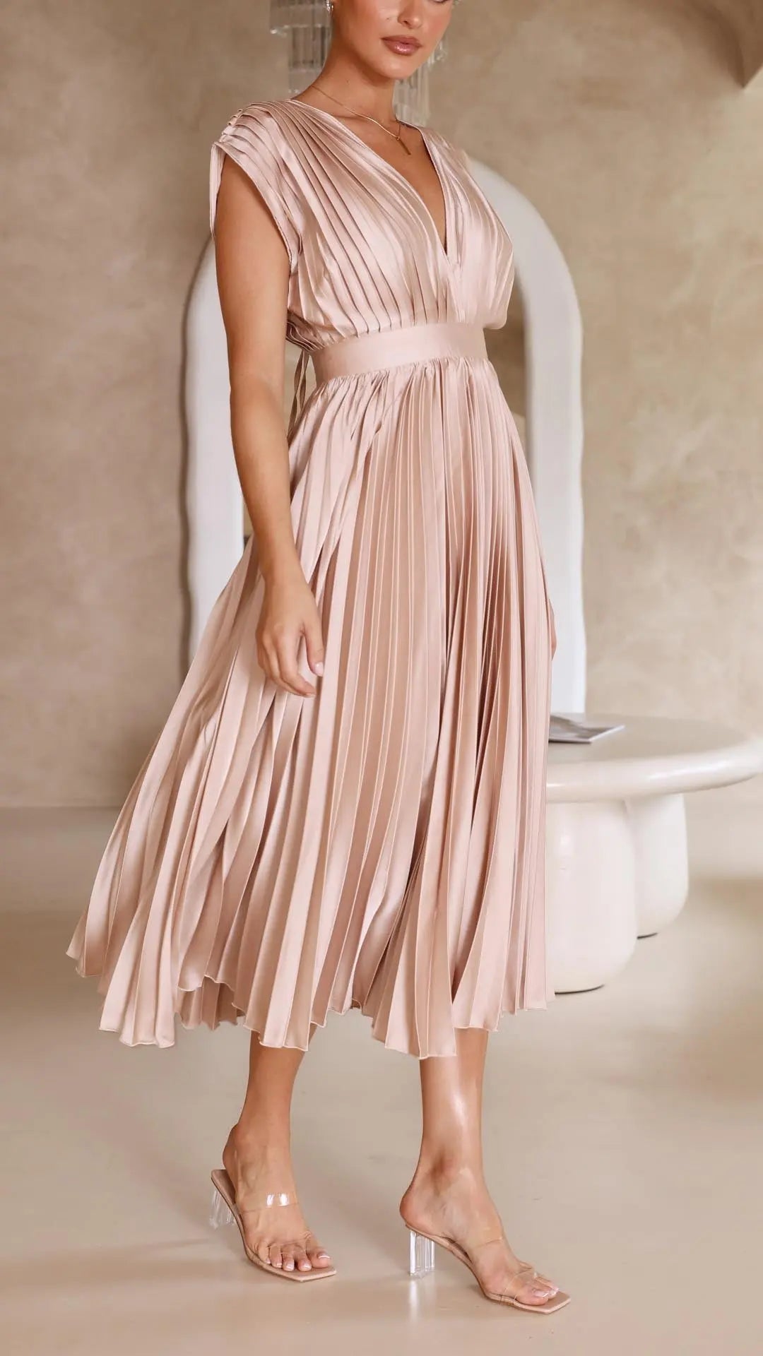 Woman wearing Pleated Maxi Dress with V-neck, high-waist — view 9 | Lunova