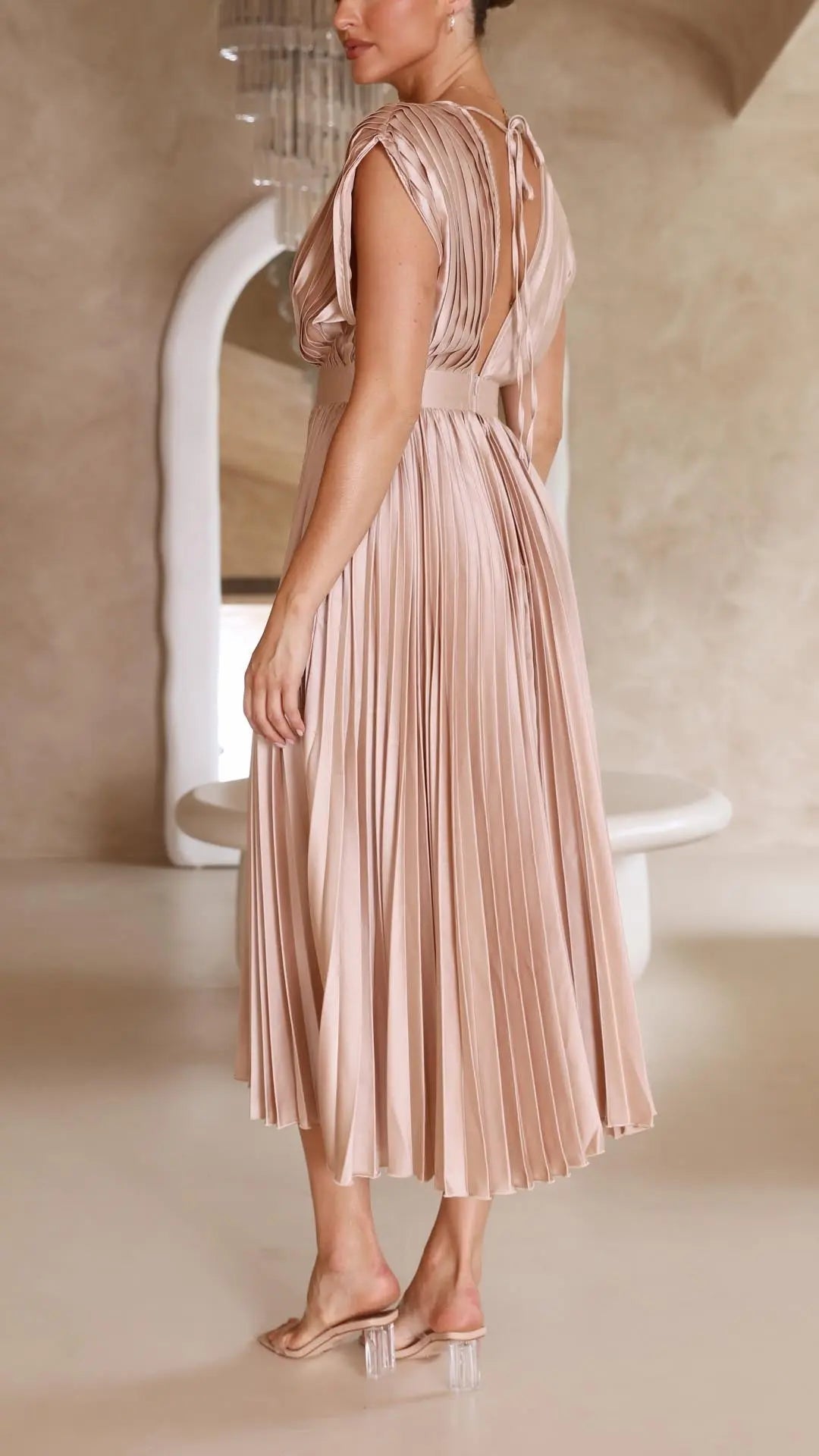 Woman wearing Pleated Maxi Dress with V-neck, high-waist — view 10 | Lunova