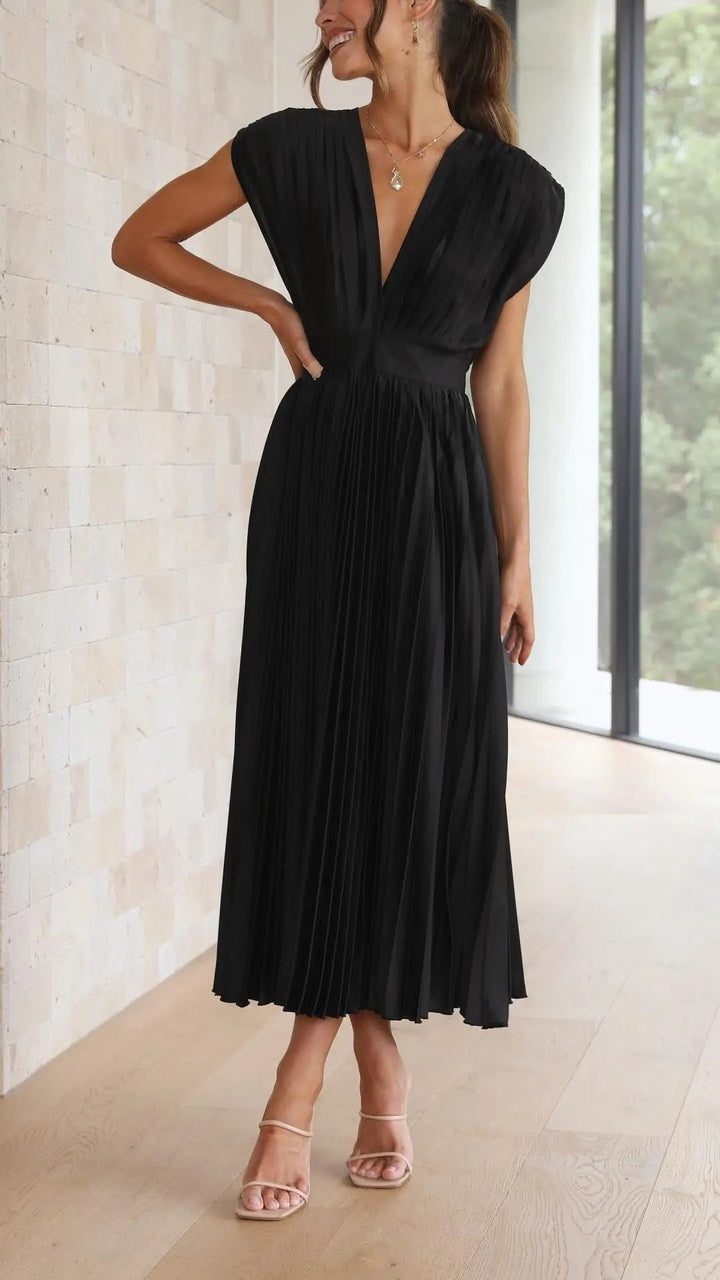 Woman wearing Pleated Maxi Dress with V-neck, high-waist — view 12 | Lunova