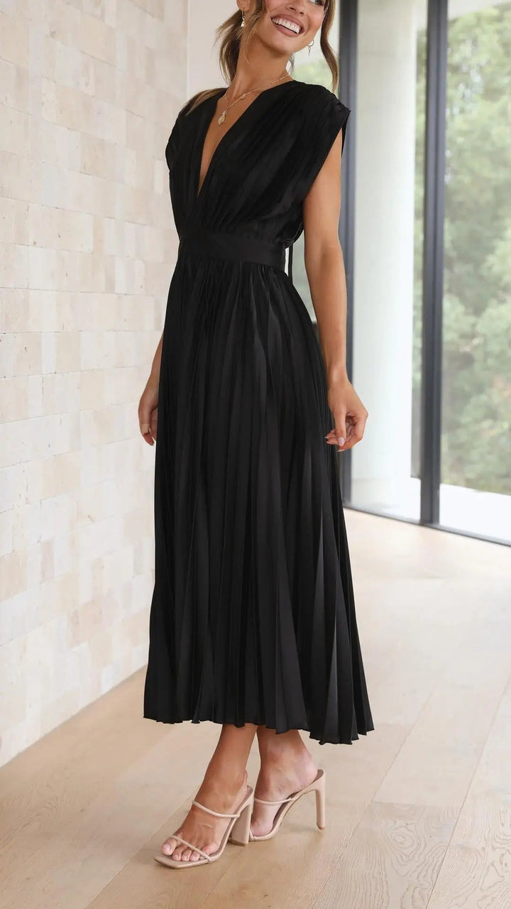 Woman wearing Pleated Maxi Dress with V-neck, high-waist — view 14 | Lunova