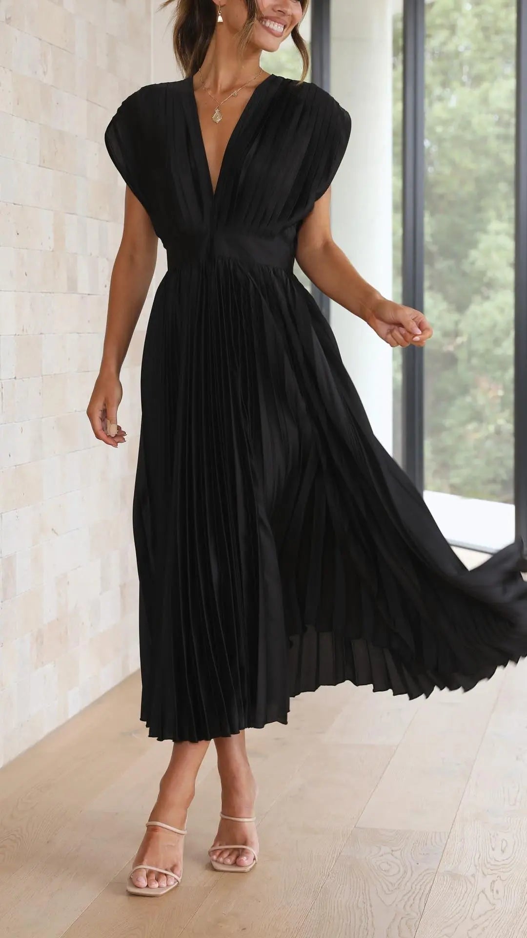 Woman wearing Pleated Maxi Dress with V-neck, high-waist — view 15 | Lunova