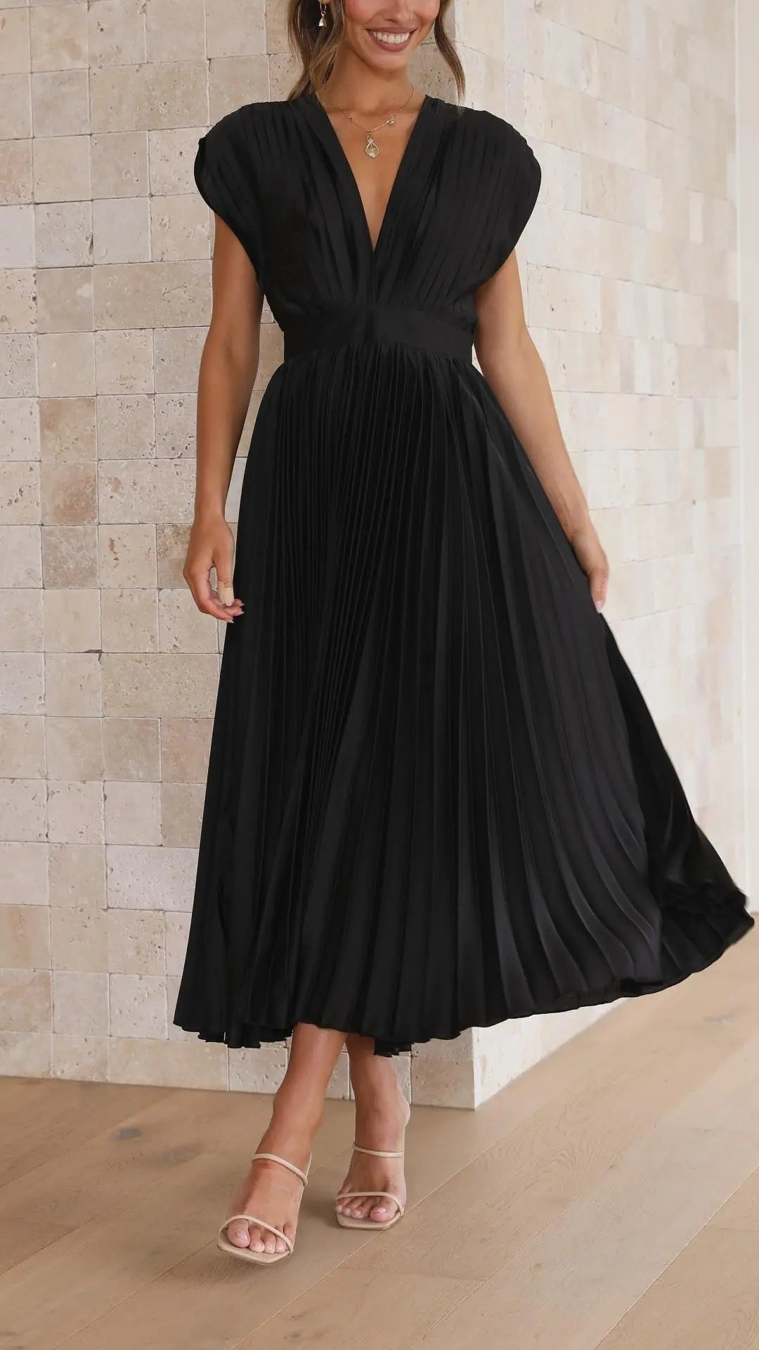 Woman wearing Black Pleated Maxi Dress with V-neck, high-waist | Lunova