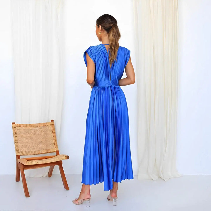 Woman wearing Pleated Maxi Dress with V-neck, high-waist — view 20 | Lunova