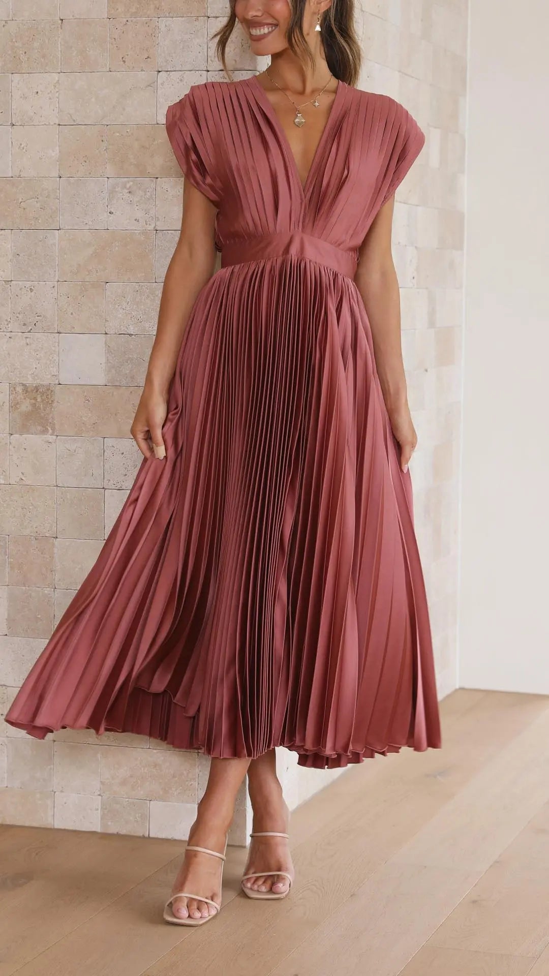 Woman wearing Rose Gold Pleated Maxi Dress with V-neck, high-waist | Lunova