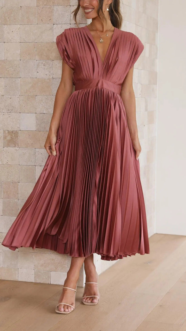 Woman wearing Rose Gold Pleated Maxi Dress with V-neck, high-waist | Lunova