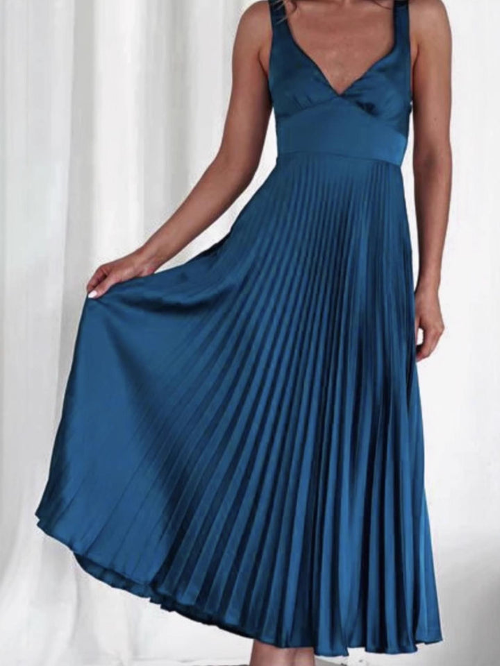 Woman wearing Dark Blue Pleated Midi Dress with A-line, flowing | Lunova