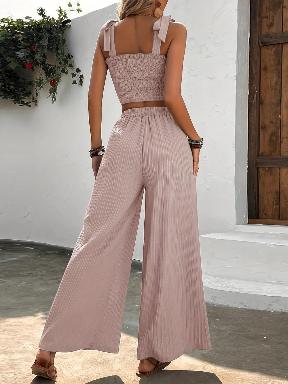 Woman wearing Pleated Two-Piece Set with wide-leg, high-waist — view 2 | Lunova
