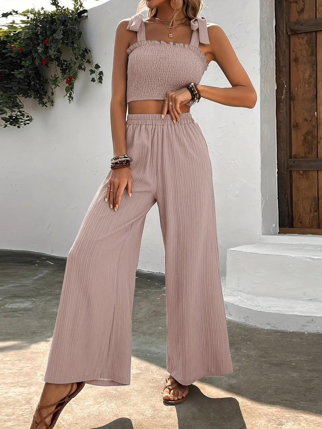 Woman wearing Pink Pleated Two-Piece Set with wide-leg, high-waist | Lunova