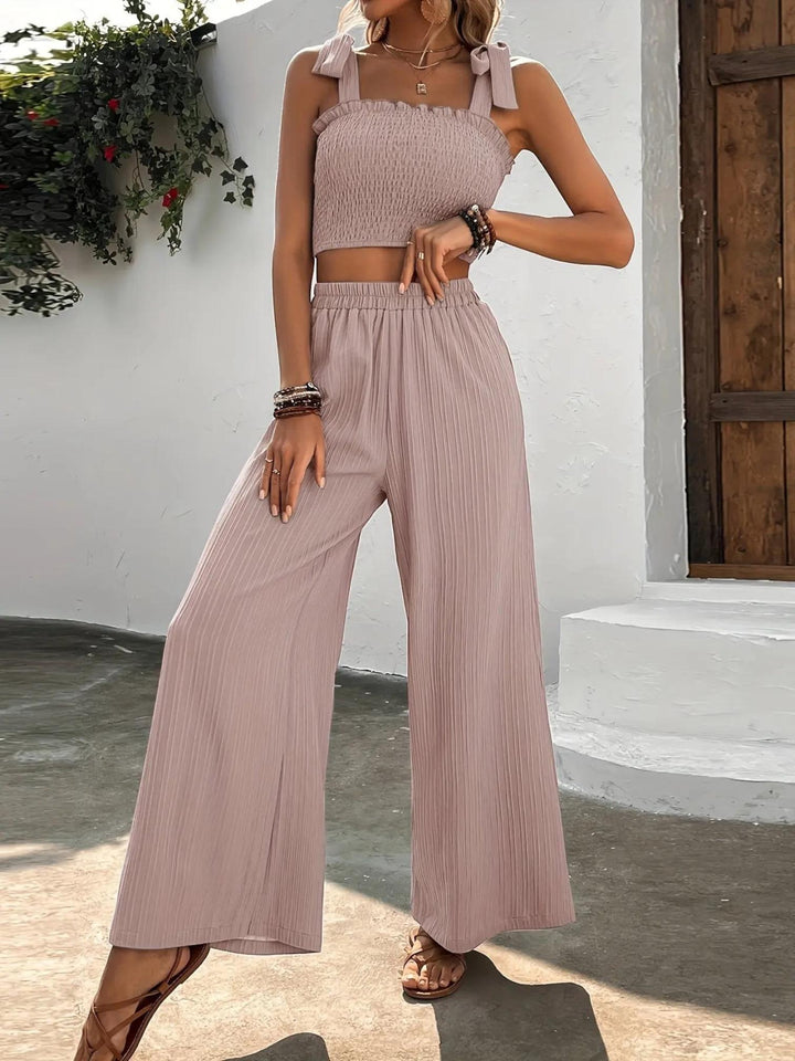 Woman wearing Pink Pleated Two-Piece Set with wide-leg, high-waist | Lunova