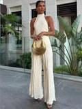 Woman wearing Beige Pleated Two-Piece Set with halter, sleeveless | Lunova