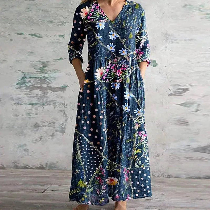 Woman wearing Navy Printed Maxi Dress with relaxed, floral print | Lunova