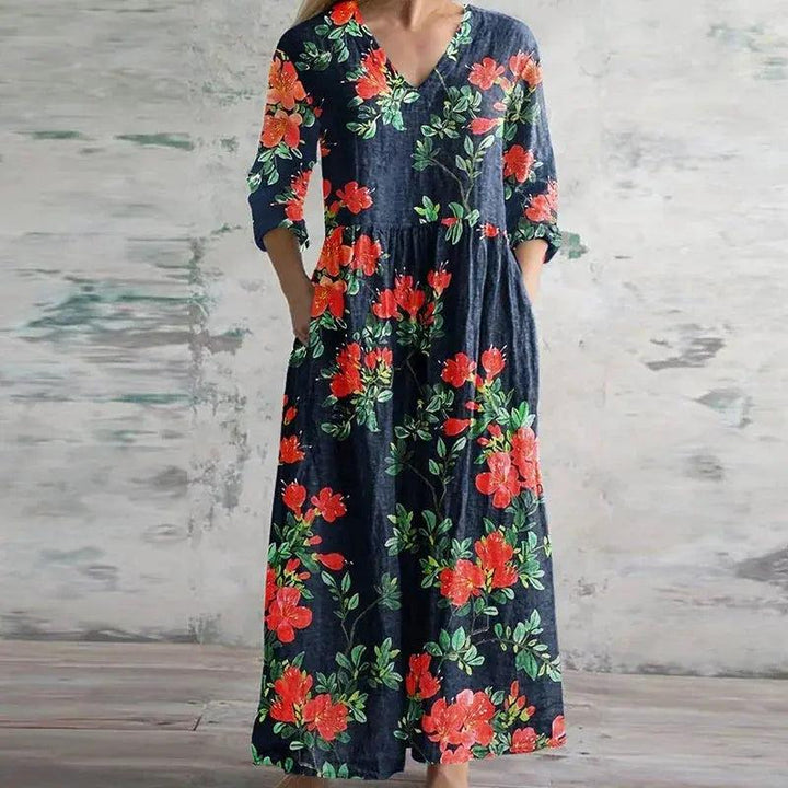 Woman wearing Dark Blue Printed Maxi Dress with relaxed, floral print | Lunova
