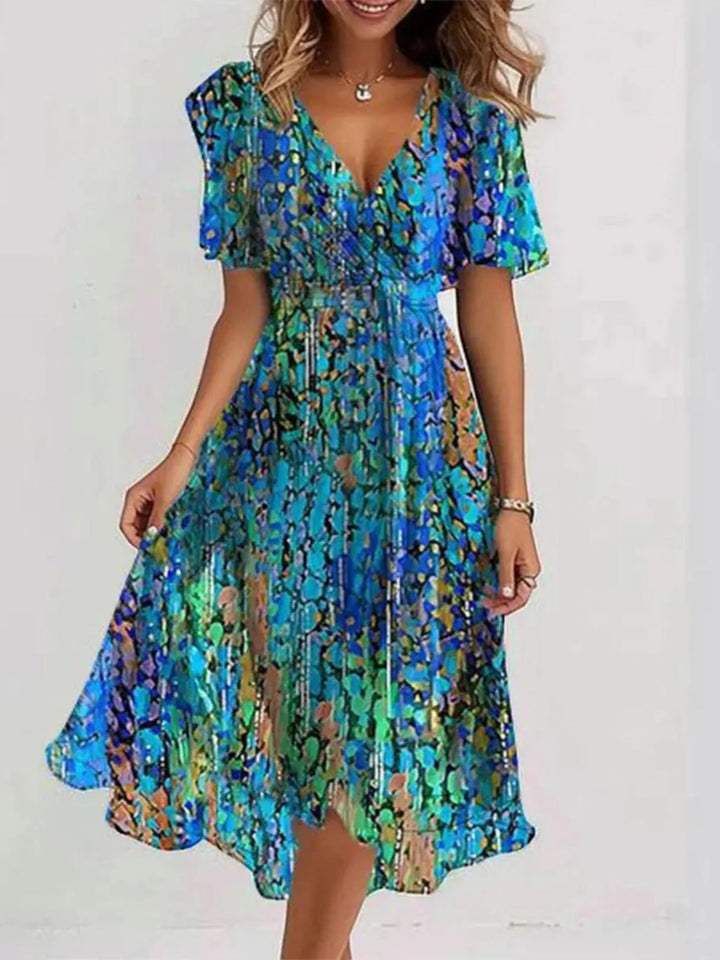 Woman wearing Blue Printed Midi Dress with flowing | Lunova