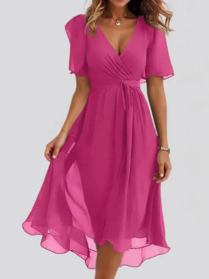 Woman wearing Pink Printed Midi Dress with flowing | Lunova