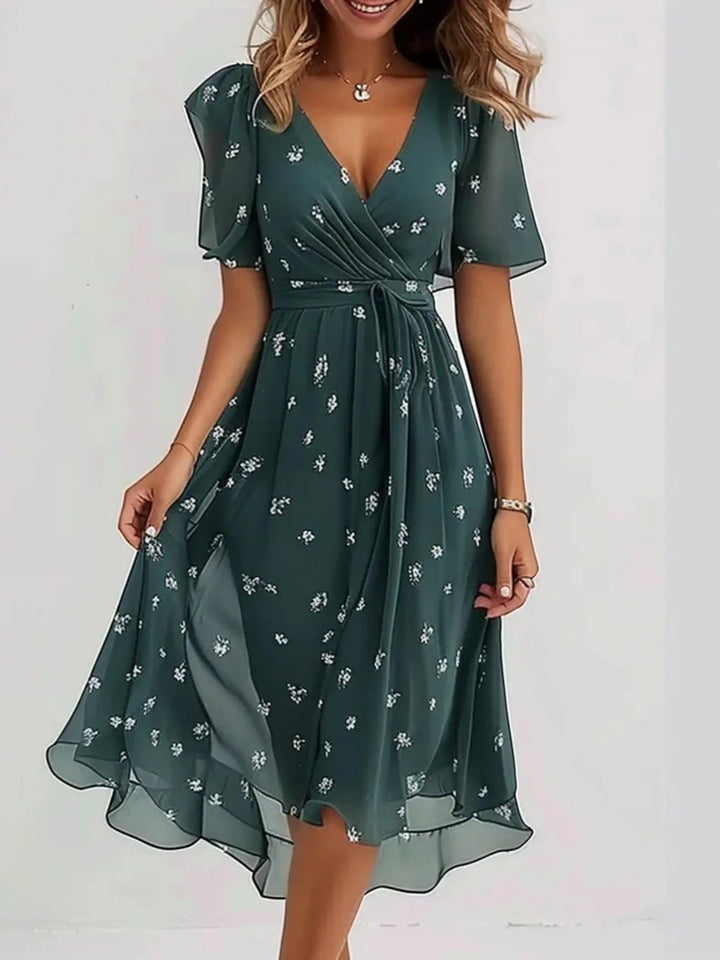 Woman wearing Green Printed Midi Dress with flowing | Lunova