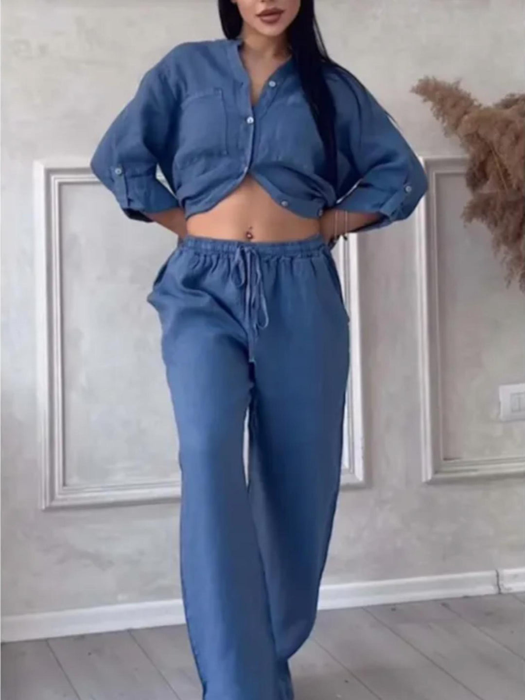 Woman wearing Blue Relaxed Two-Piece Set with button-front, drawstring | Lunova