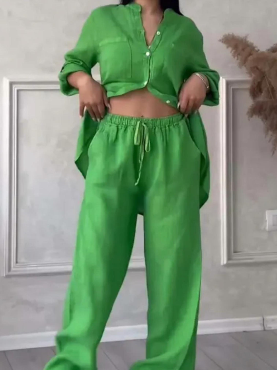 Woman wearing Green Relaxed Two-Piece Set with button-front, drawstring | Lunova