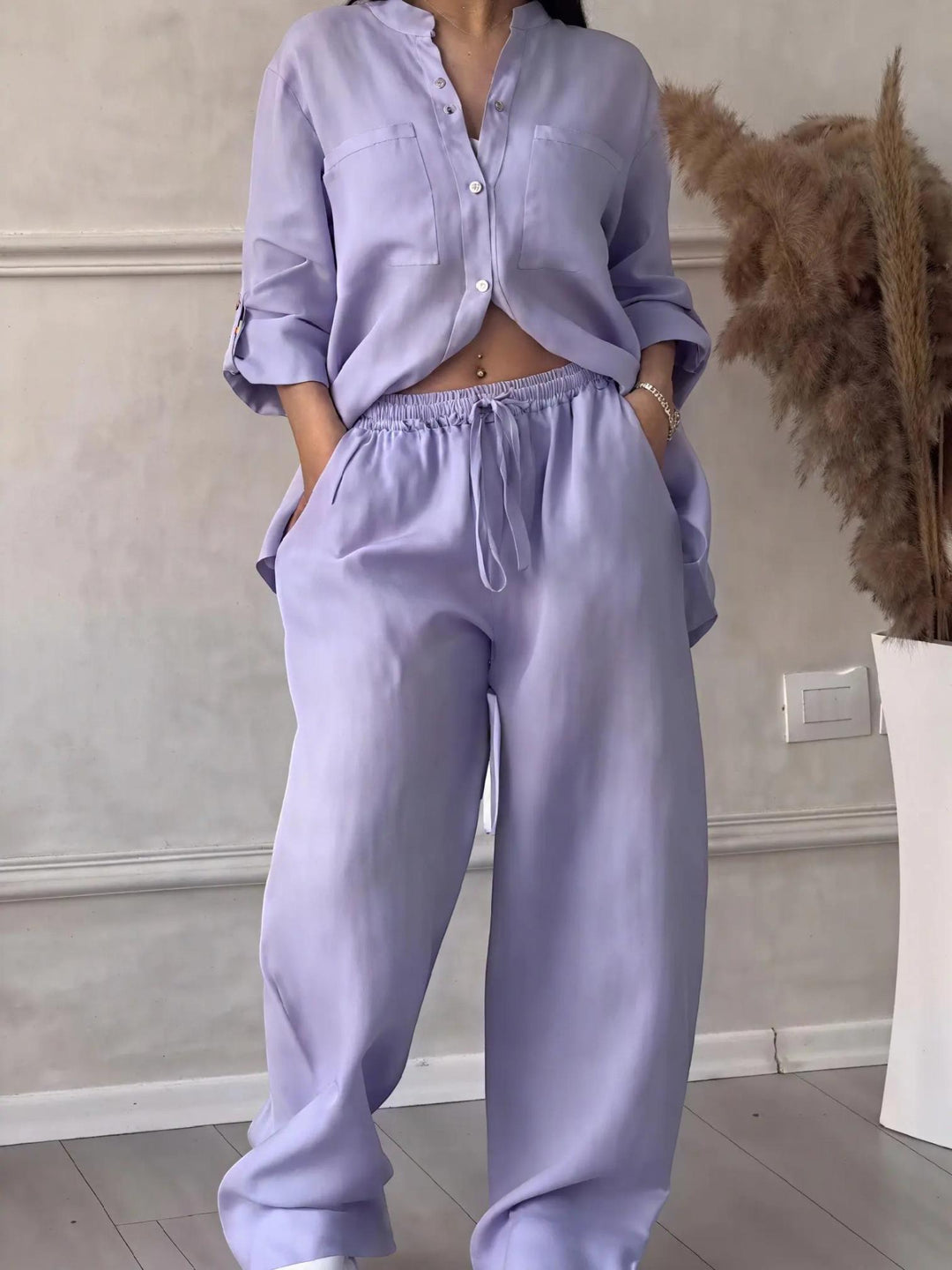 Woman wearing Purple Relaxed Two-Piece Set with button-front, drawstring | Lunova