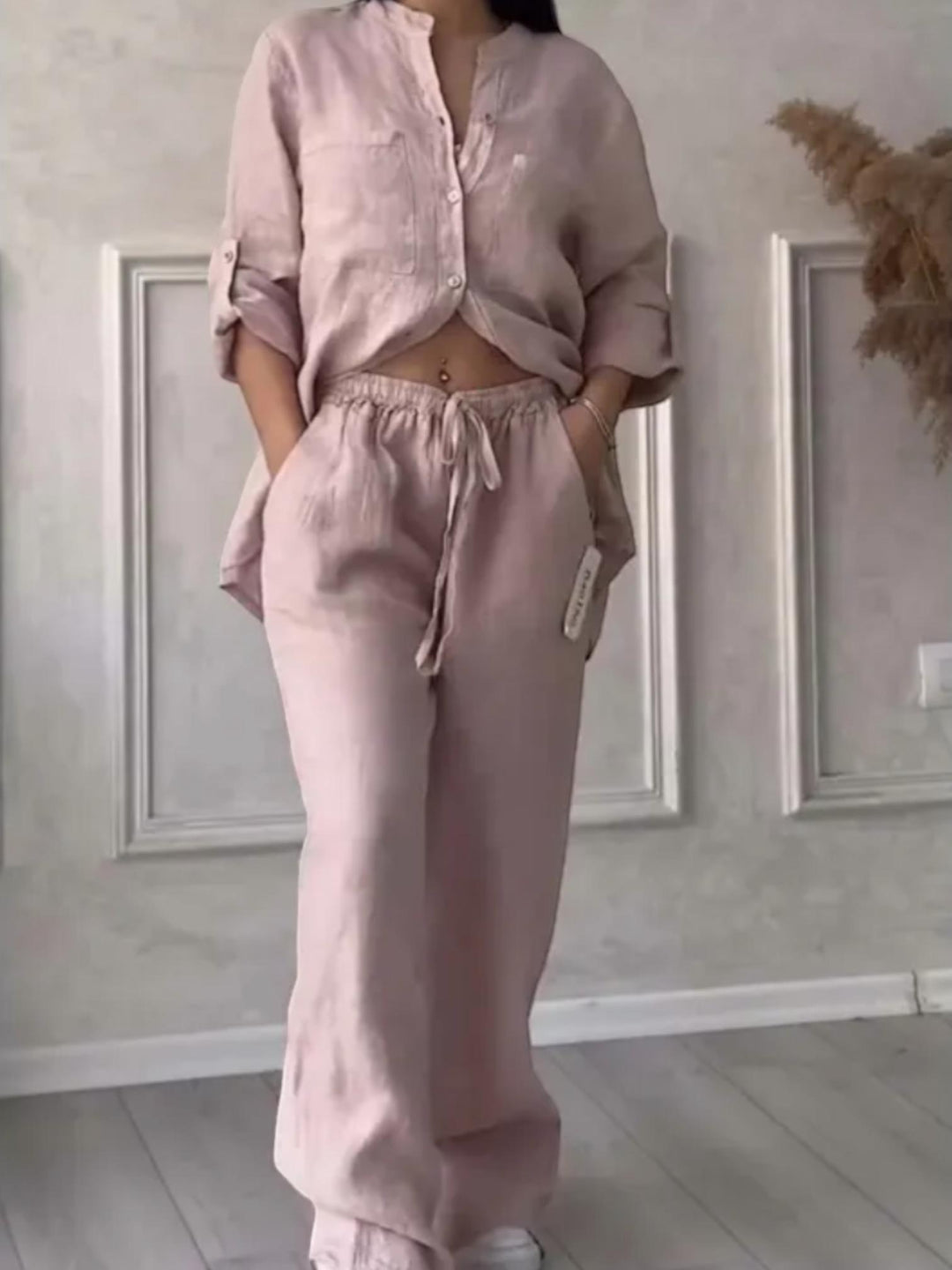 Woman wearing Light Pink Relaxed Two-Piece Set with button-front, drawstring | Lunova