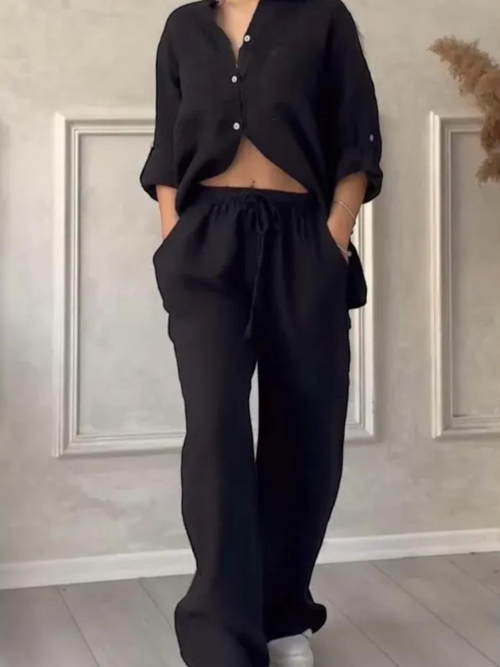 Woman wearing Black Relaxed Two-Piece Set with button-front, drawstring | Lunova