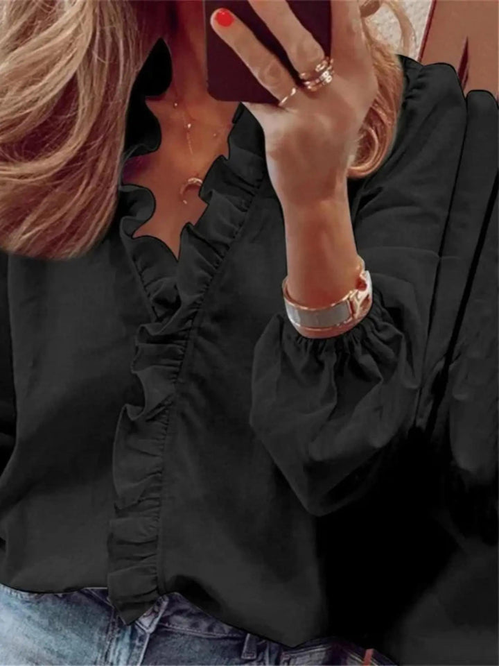 Woman wearing Black Ruffle V-Neck Blouse with ruffled, button-front | Lunova