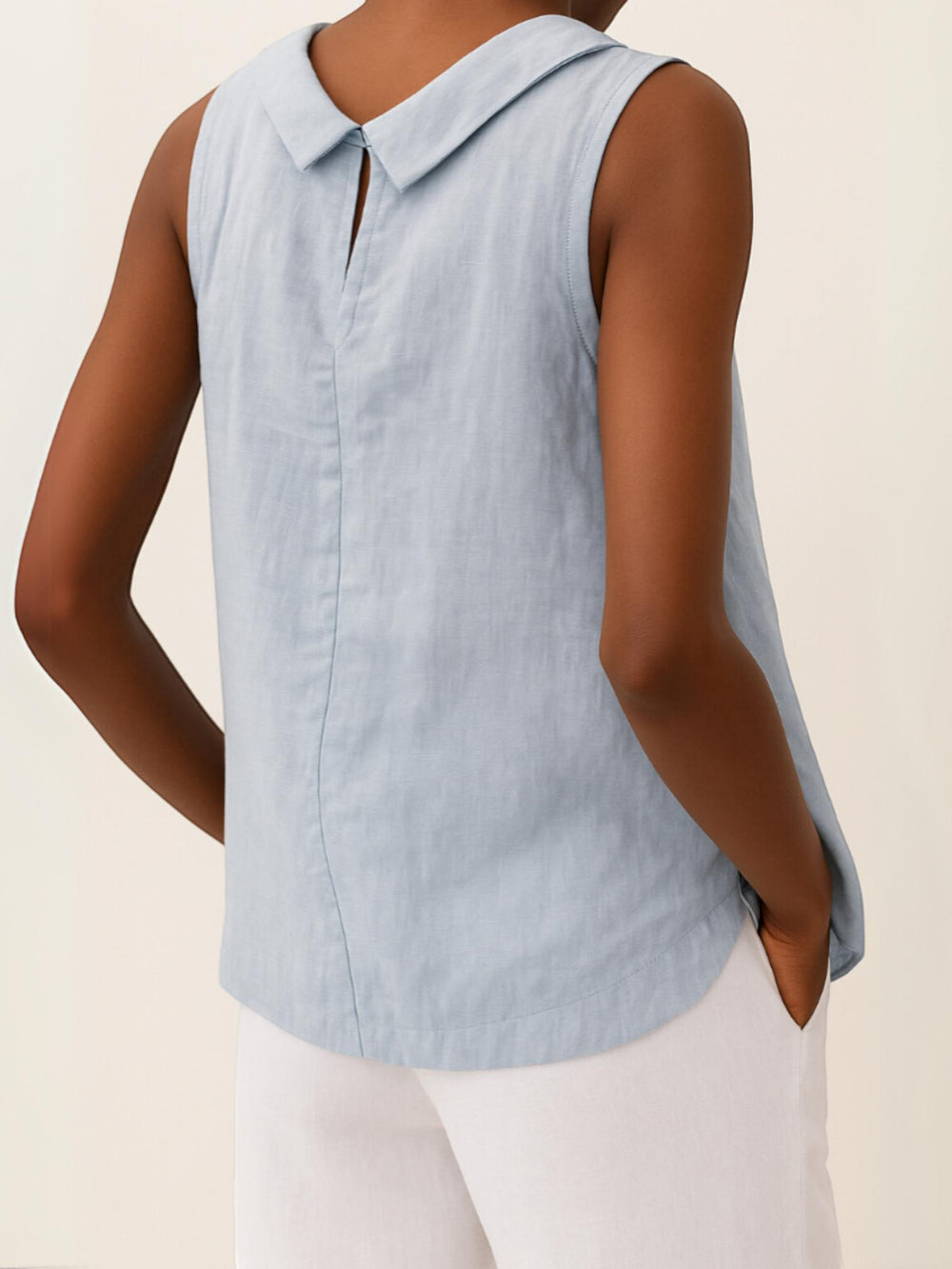 Woman wearing Sleeveless Roll Collar Top with relaxed, sleeveless — view 2 | Lunova