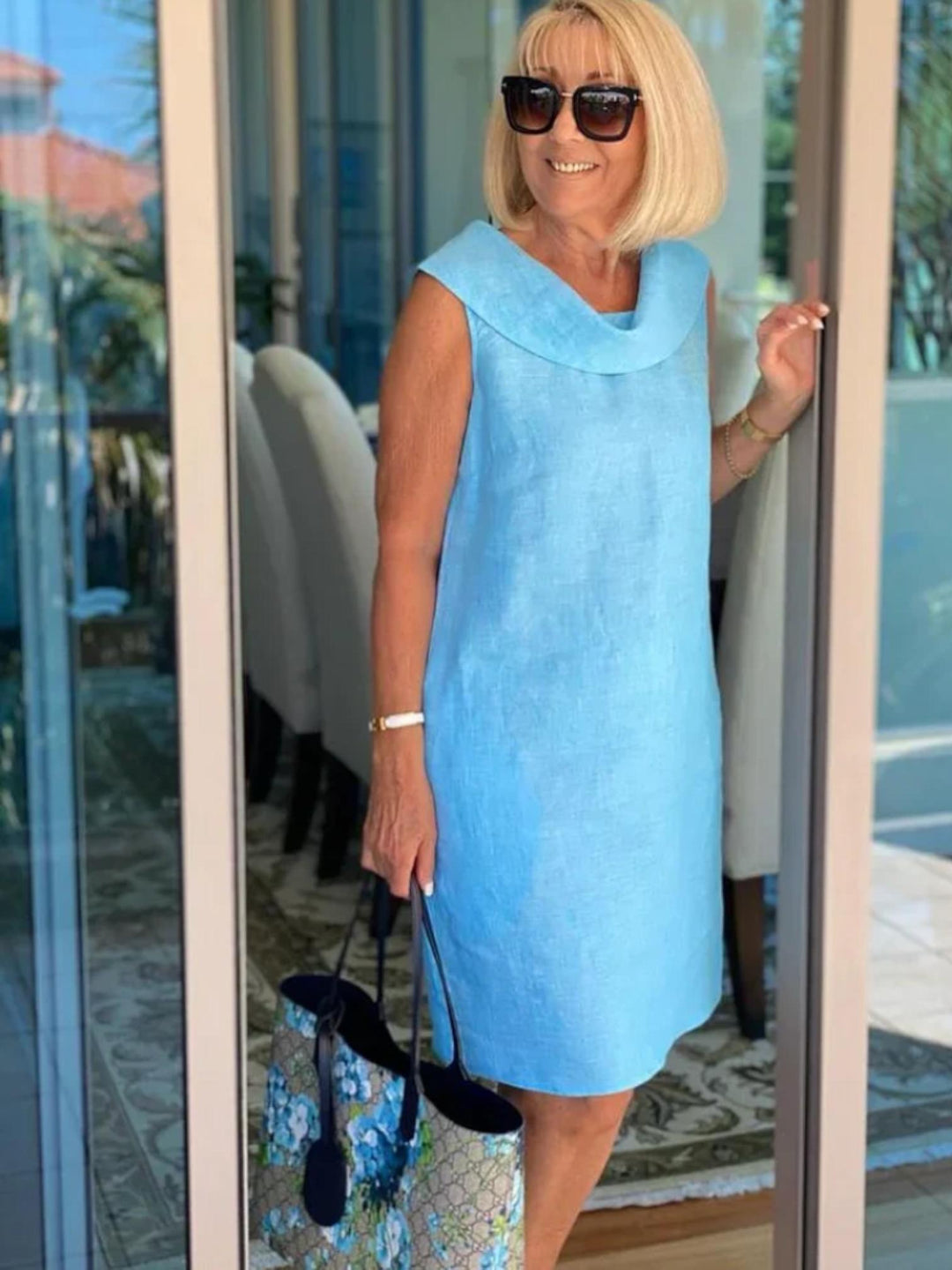 Woman wearing Light Blue Sleeveless Shift Dress with relaxed, sleeveless | Lunova