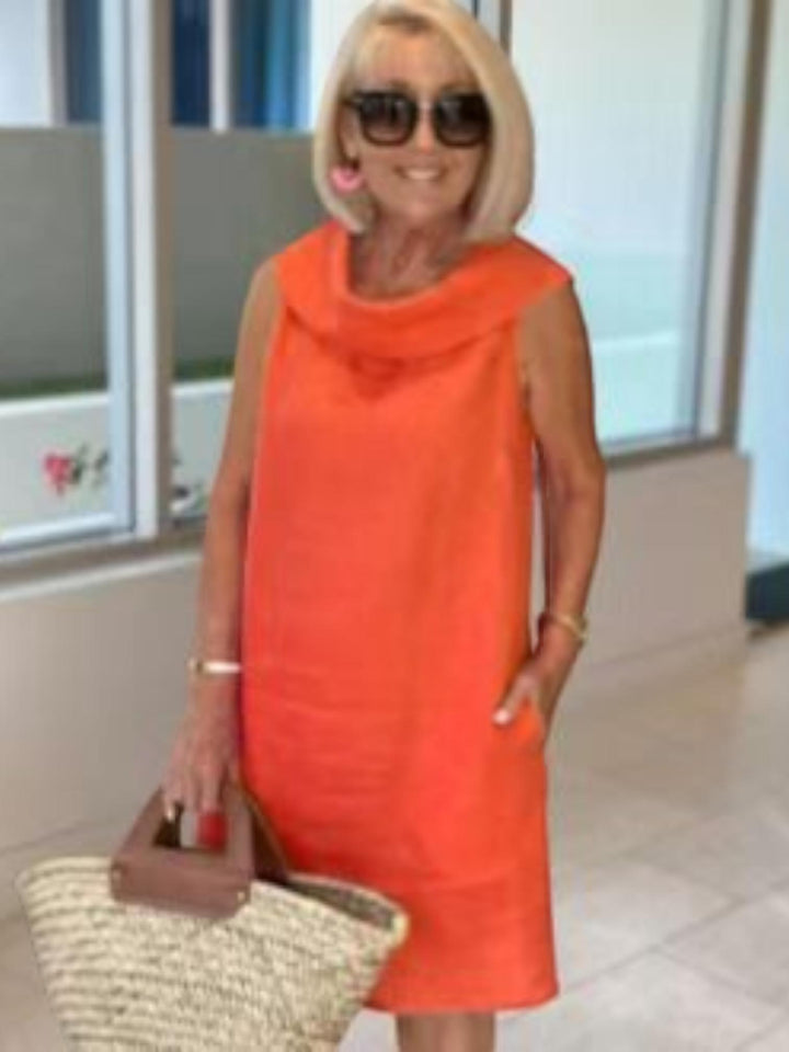 Woman wearing Orange Sleeveless Shift Dress with relaxed, sleeveless | Lunova