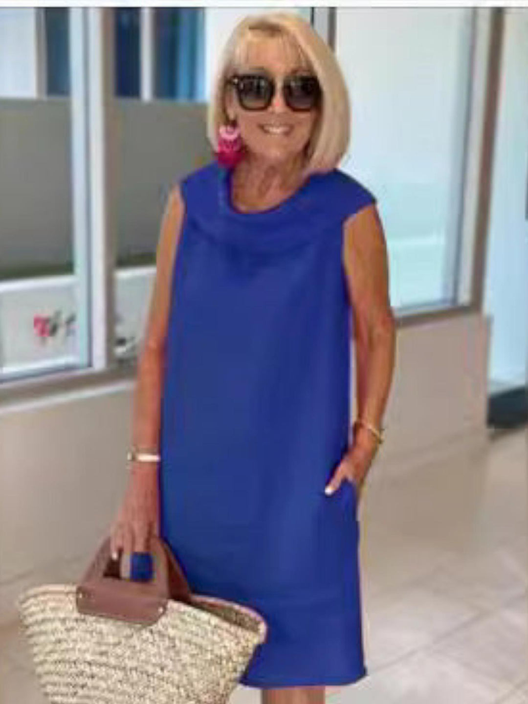 Woman wearing Blue Sleeveless Shift Dress with relaxed, sleeveless | Lunova
