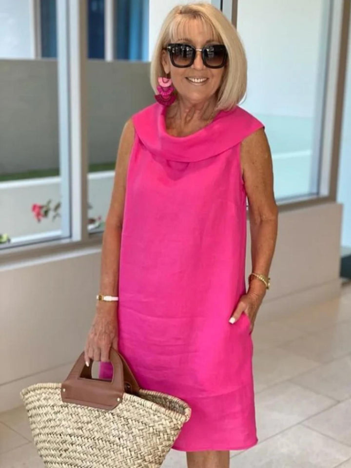 Woman wearing Hot Pink Sleeveless Shift Dress with relaxed, sleeveless | Lunova