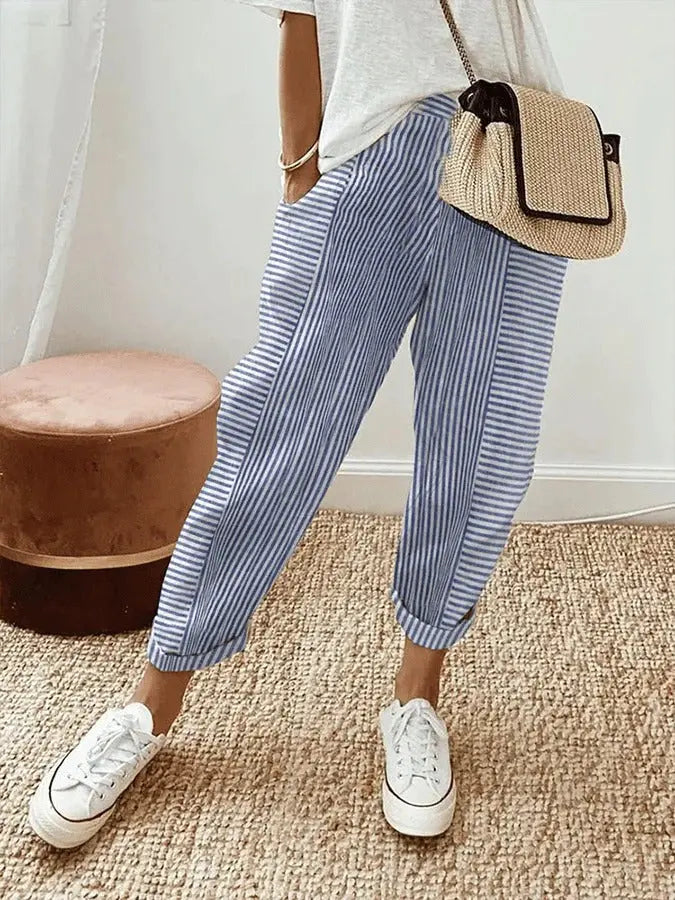Woman wearing Light Blue Striped Relaxed Fit Trousers with drawstring, relaxed | Lunova