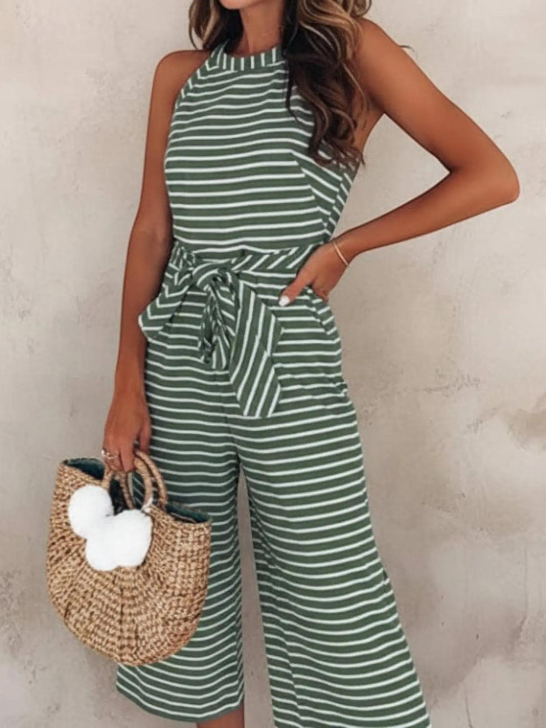 Woman wearing Green Striped Sleeveless Jumpsuit with sleeveless, wide-leg | Lunova