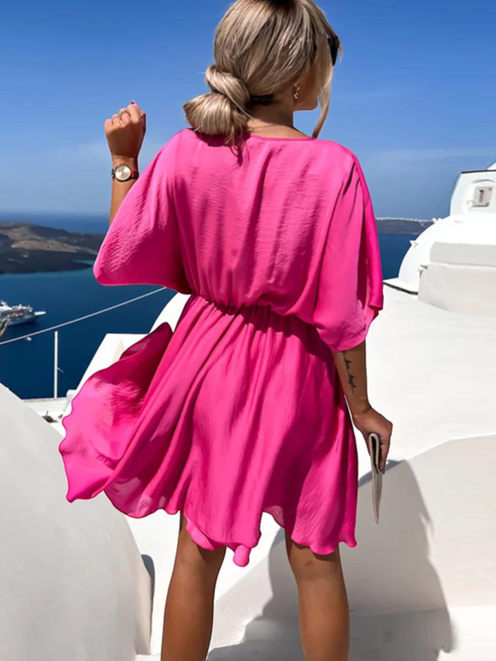 Woman wearing Surplice Mini Dress with A-line, wrap — view 9 | Lunova