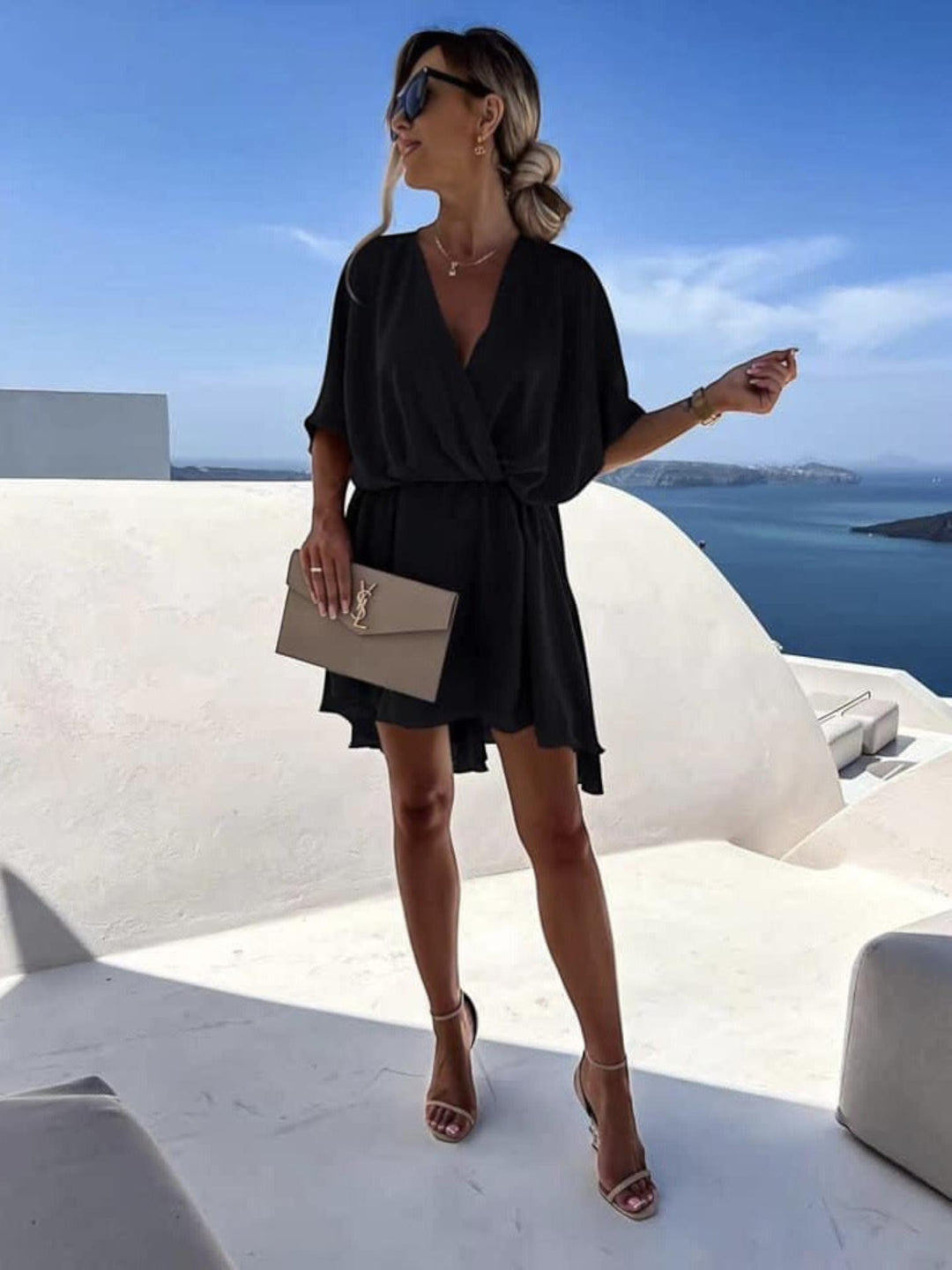 Woman wearing Black Surplice Mini Dress with A-line, wrap | Lunova