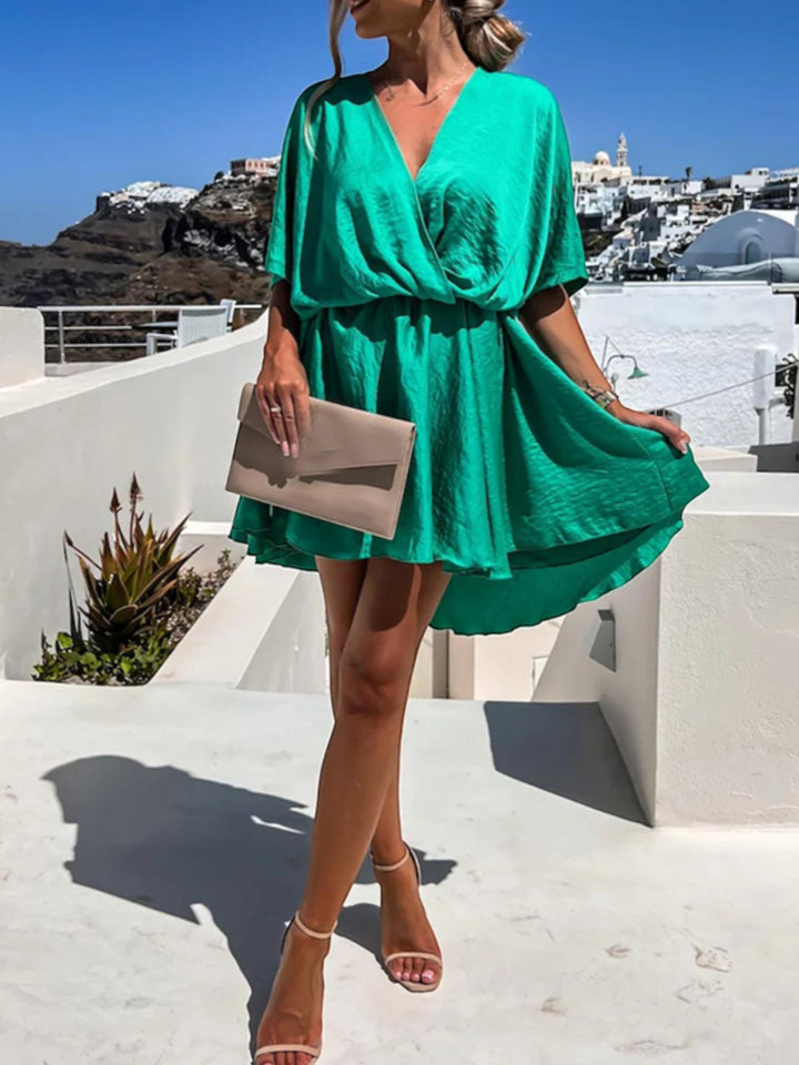 Woman wearing Surplice Mini Dress with A-line, wrap — view 3 | Lunova