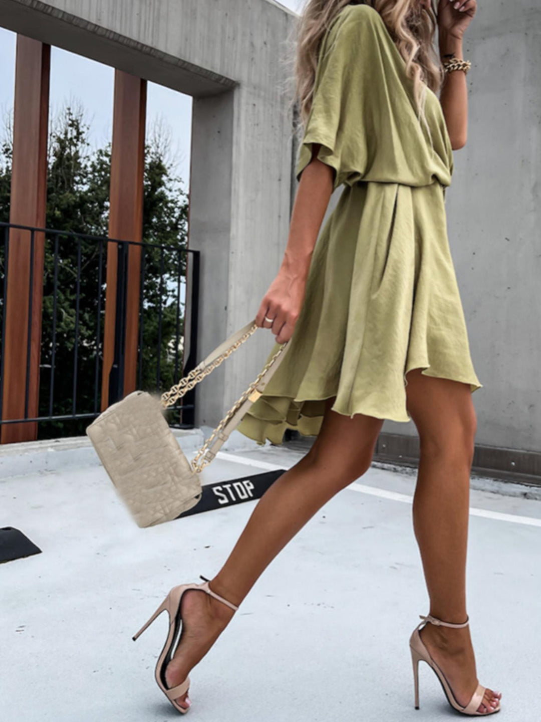 Woman wearing Surplice Mini Dress with A-line, wrap — view 4 | Lunova