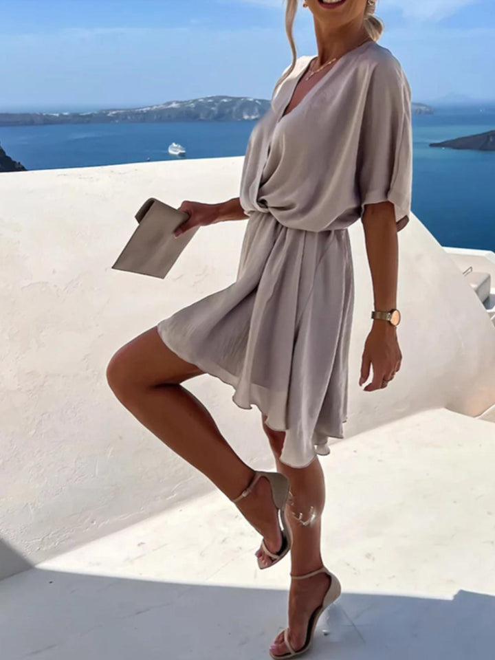 Woman wearing Surplice Mini Dress with A-line, wrap — view 6 | Lunova