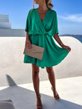 Woman wearing Green Surplice Mini Dress with A-line, wrap | Lunova