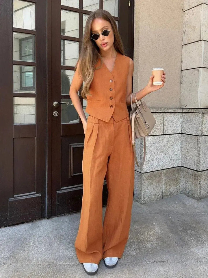 Woman wearing Orange Tailored Two-Piece Set with sleeveless, high-waist | Lunova