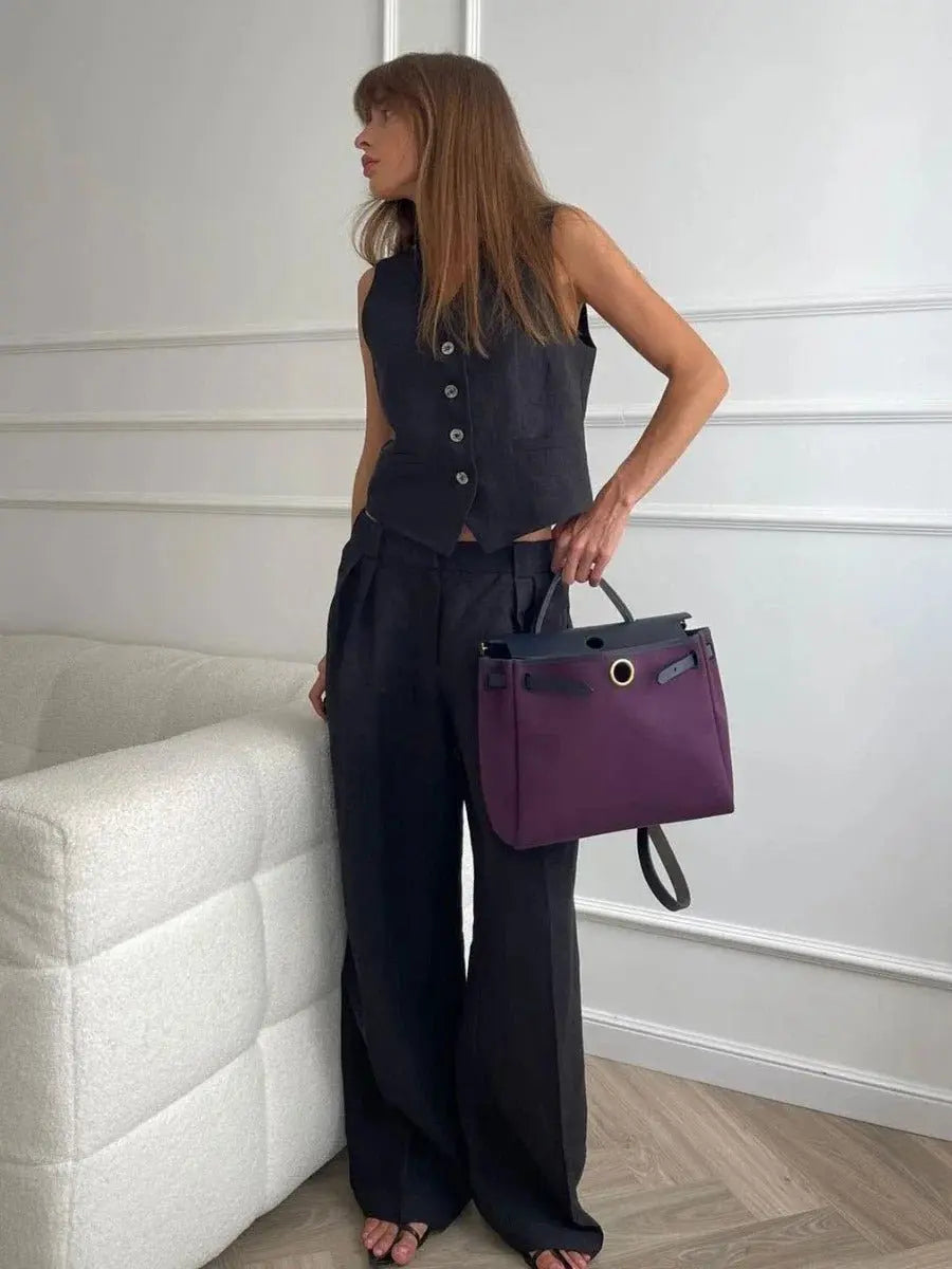 Woman wearing Black Tailored Two-Piece Set with sleeveless, high-waist | Lunova