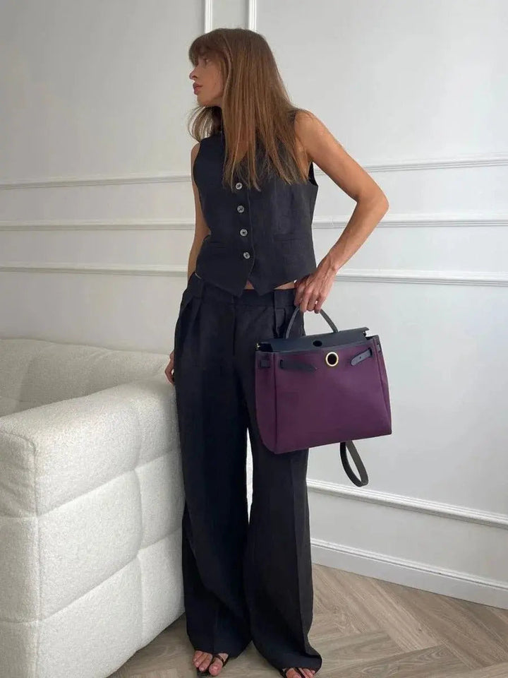 Woman wearing Black Tailored Two-Piece Set with sleeveless, high-waist | Lunova