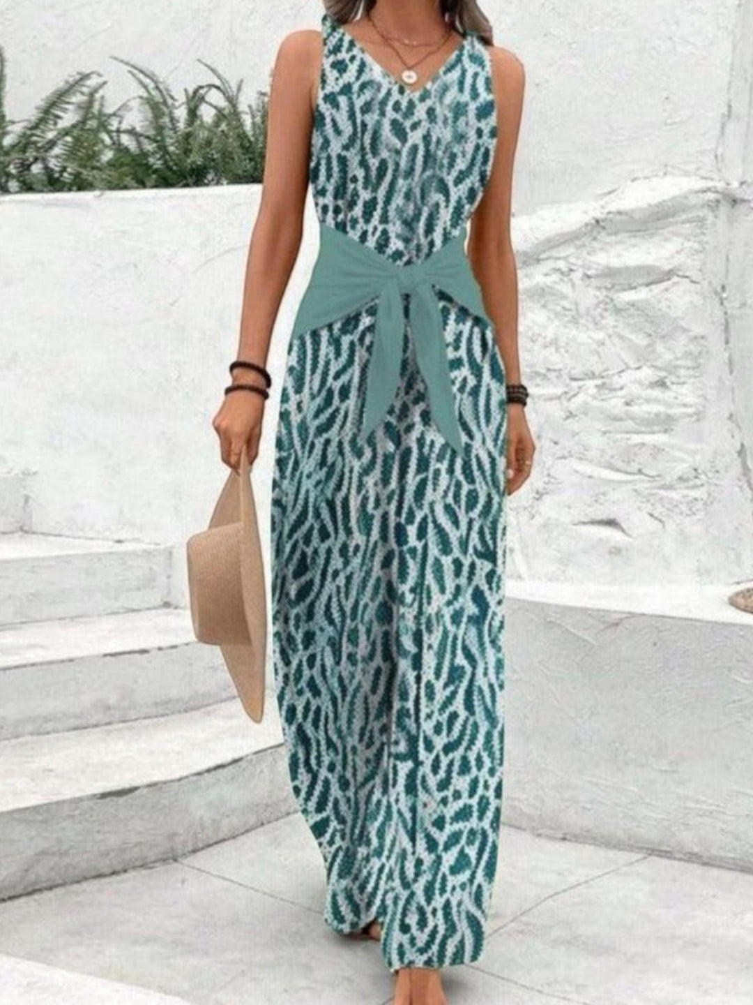 Woman wearing Green Tie-Waist Jumpsuit with wide-leg | Lunova