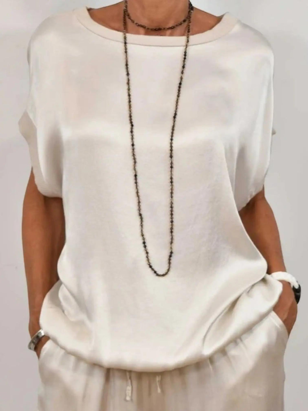 Woman wearing Two-Piece Set with drawstring, relaxed — view 3 | Lunova