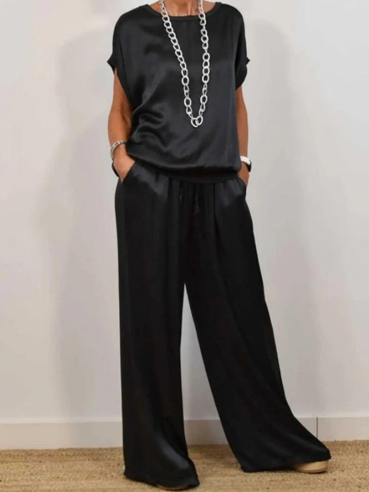 Woman wearing Black Two-Piece Set with drawstring, relaxed | Lunova