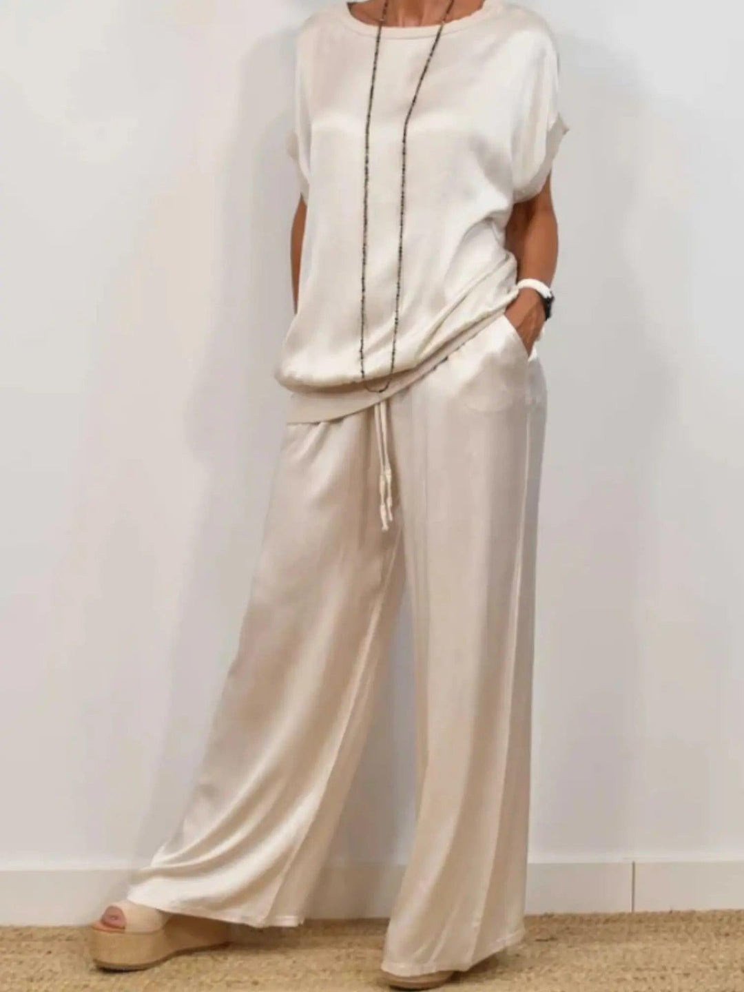Woman wearing White Two-Piece Set with drawstring, relaxed | Lunova