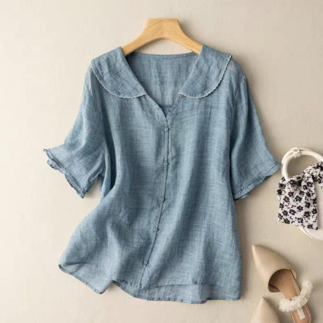 Woman wearing Blue Vintage Blouse with button-front, flowing | Lunova