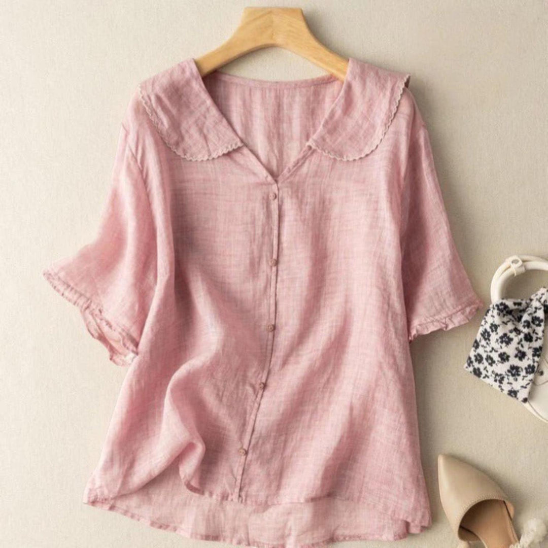 Woman wearing Pink Vintage Blouse with button-front, flowing | Lunova
